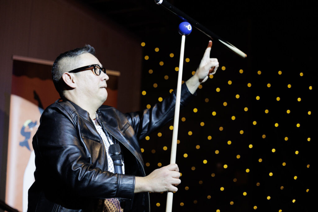 pool ball and cue balance trick