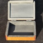 wooden box for holding playing cards for a magic trick