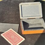 wooden box with a playing card