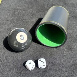 two dice on a dice cup with an eight ball