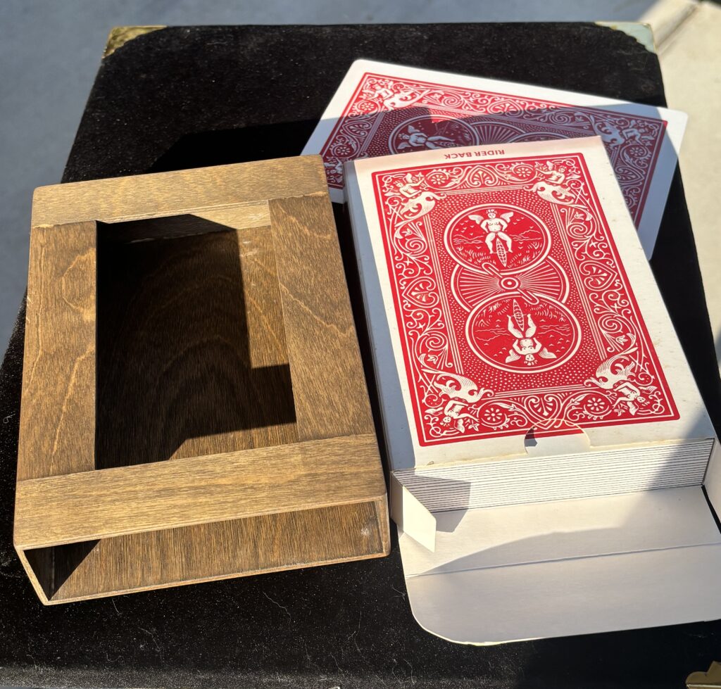 deck of cards and wooden box