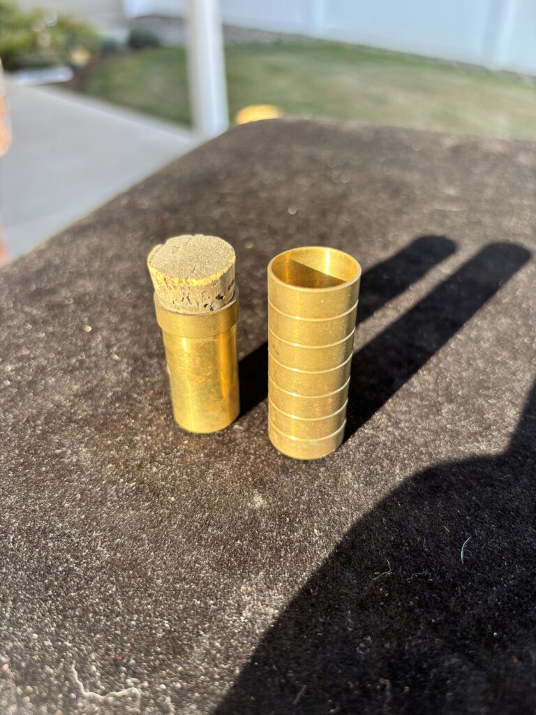 two brass tubes