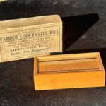 wooden box and vintage magic trick packaging