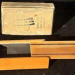 wooden box and vintage magic trick packaging