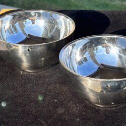 two metal bowls for holding water for the water from above magic trick