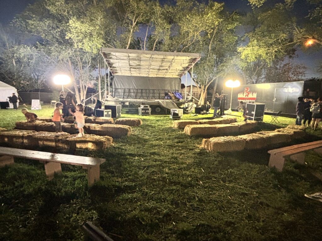 hay bales in front of a stage