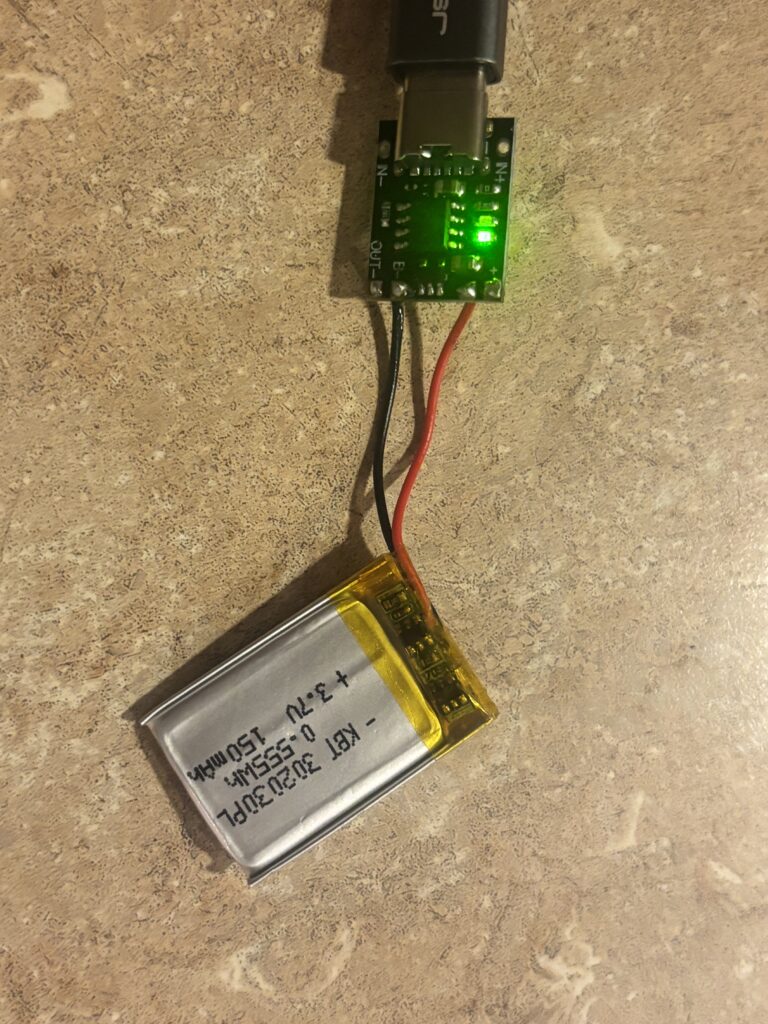 lithium battery plugged into a charger