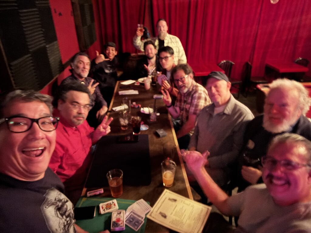 magicians sitting at a table